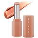 Помада для губ Fenty Beauty Gloss Bomb Stix High-Shine Gloss Stick оттенок - Fenty Glow, 3.6г  783-369 фото 1